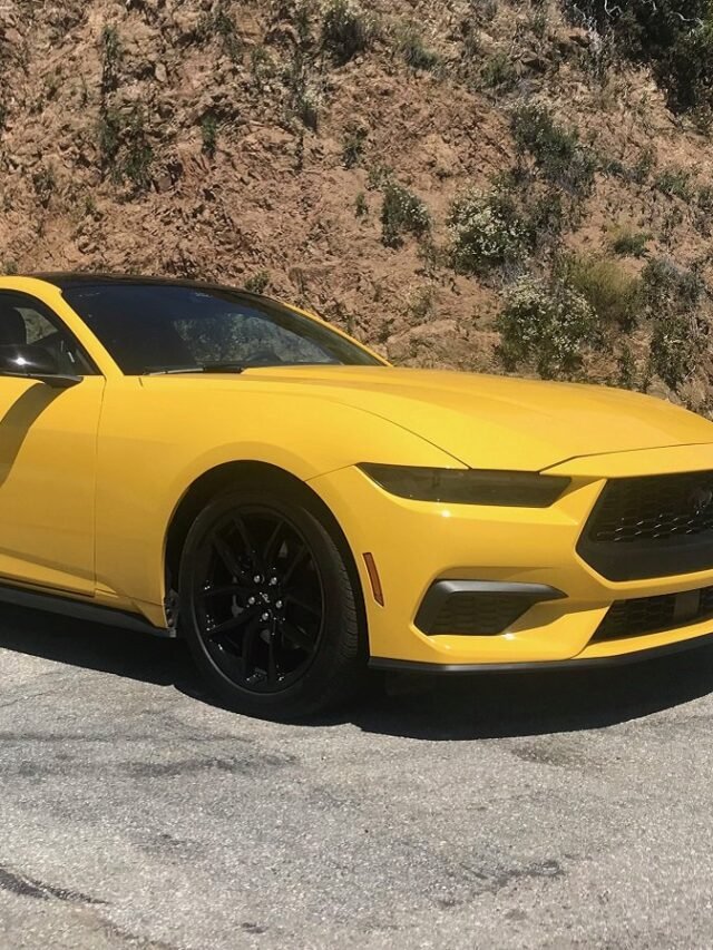 JDP_2024 Ford Mustang EcoBoost Premium Yellow Front Quarter View